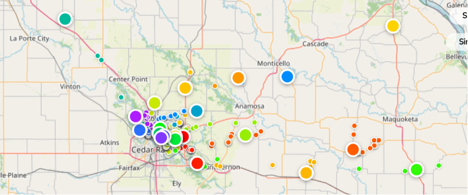 The map displays various locations, including cities and towns in Iowa and Minnesota, marked with different colors. 
AI-generated content may be incorrect.